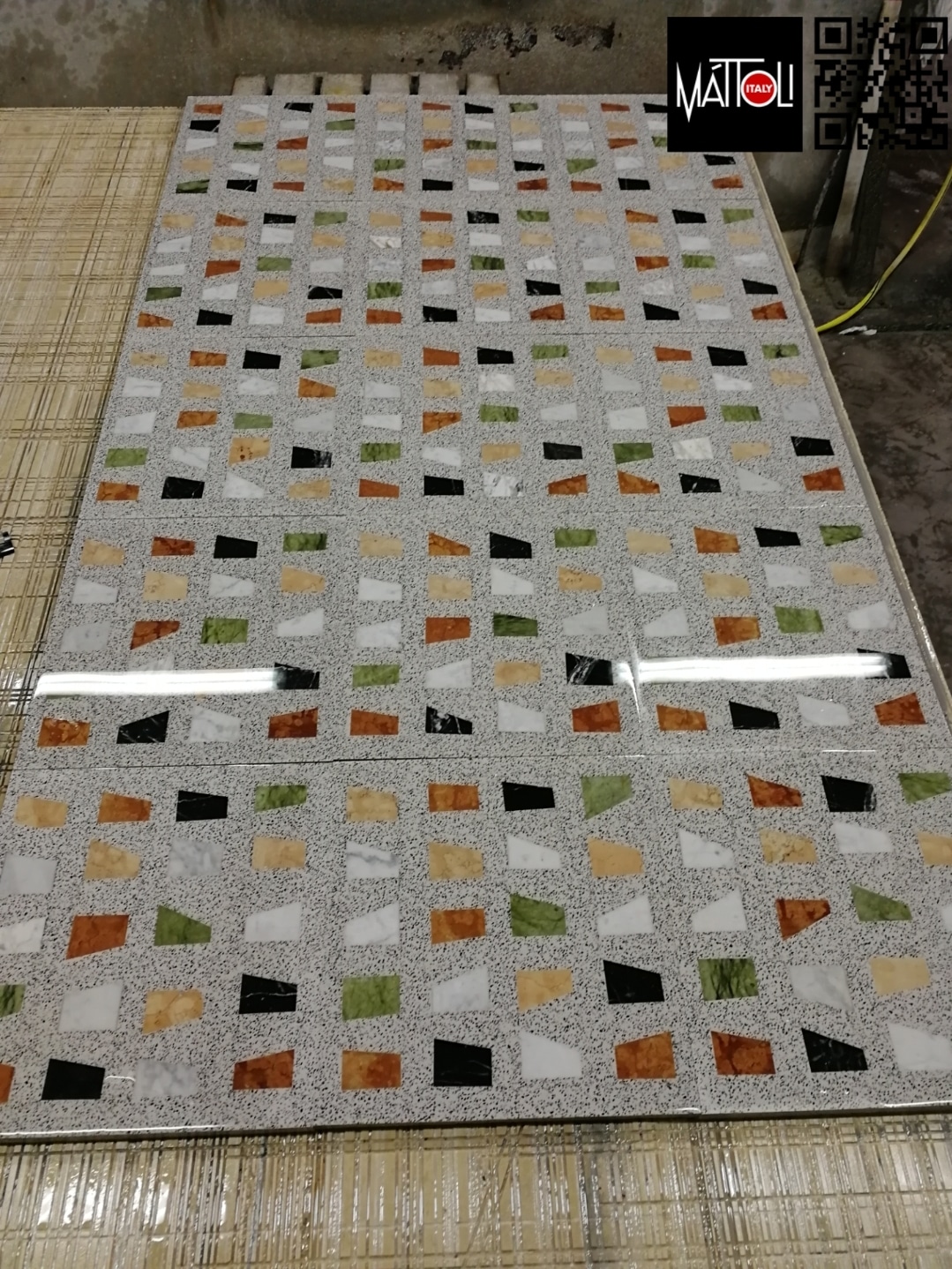Multi-colored terrazzo tiles made of marble little slabs
